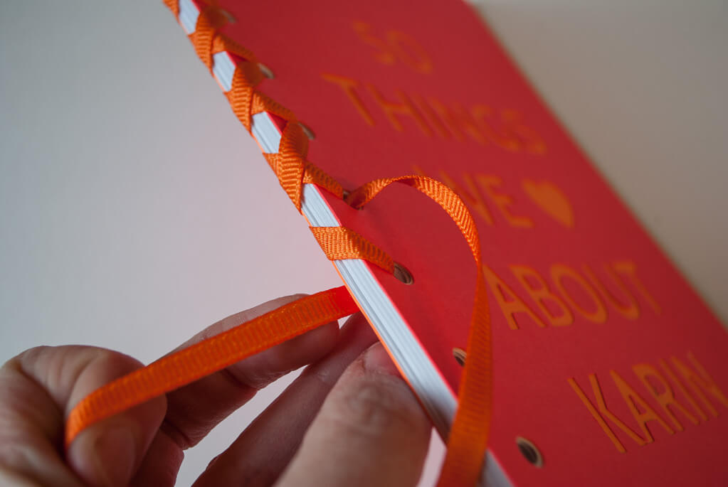 Book binding using ribbon