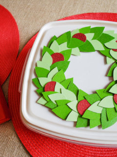 Decorate tupperware storage containers with a wreath for holiday cookie exchanges - it removes easily to wash and re-use next year. #tupperware #velcrobrand #spon #handmadewithjoann #christmas #cookies #christmascookies #wreath #papercrafts #christmaswreath