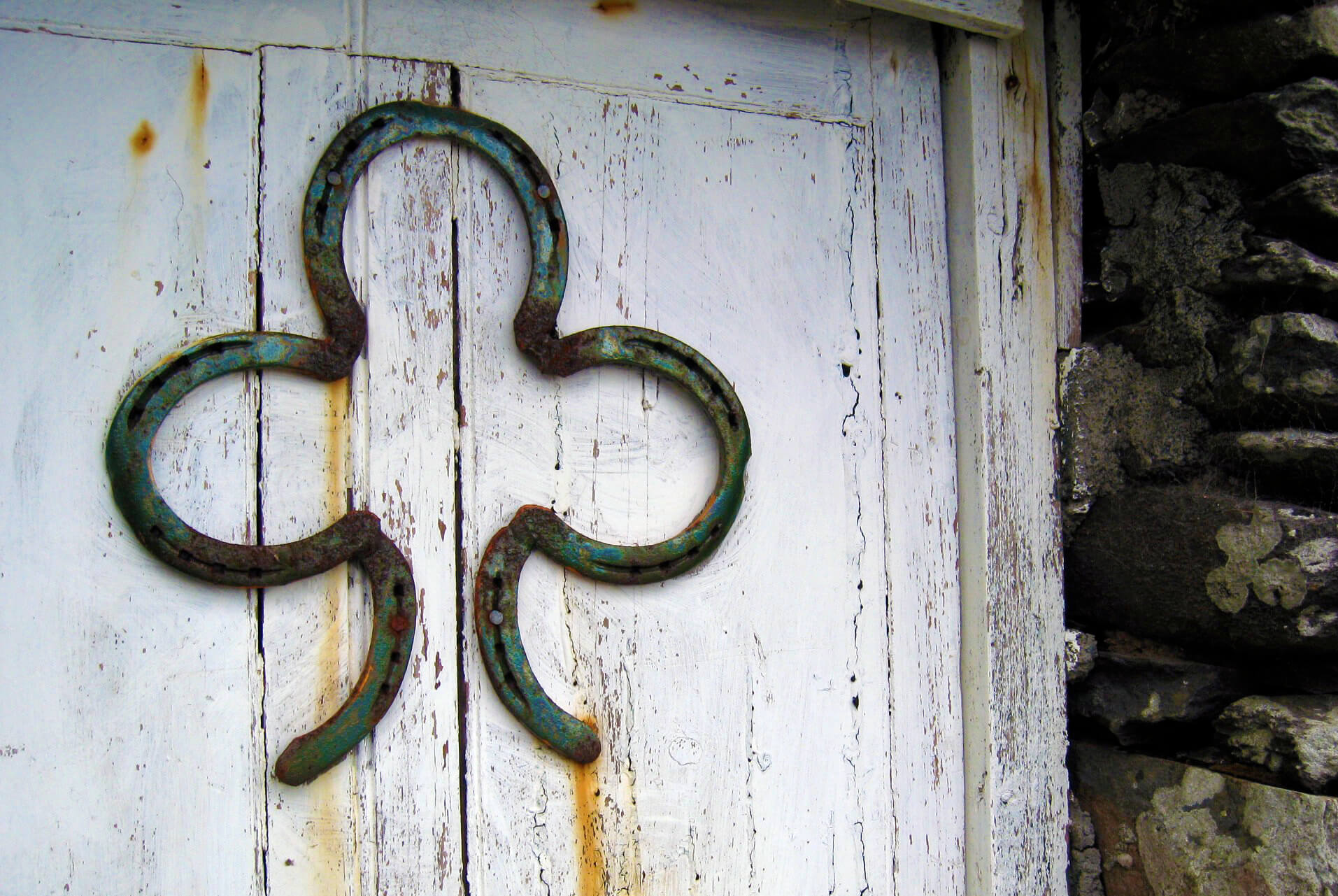 Clover made from horseshoes photo taken in Dingle, Ireland by Kathy Beymer