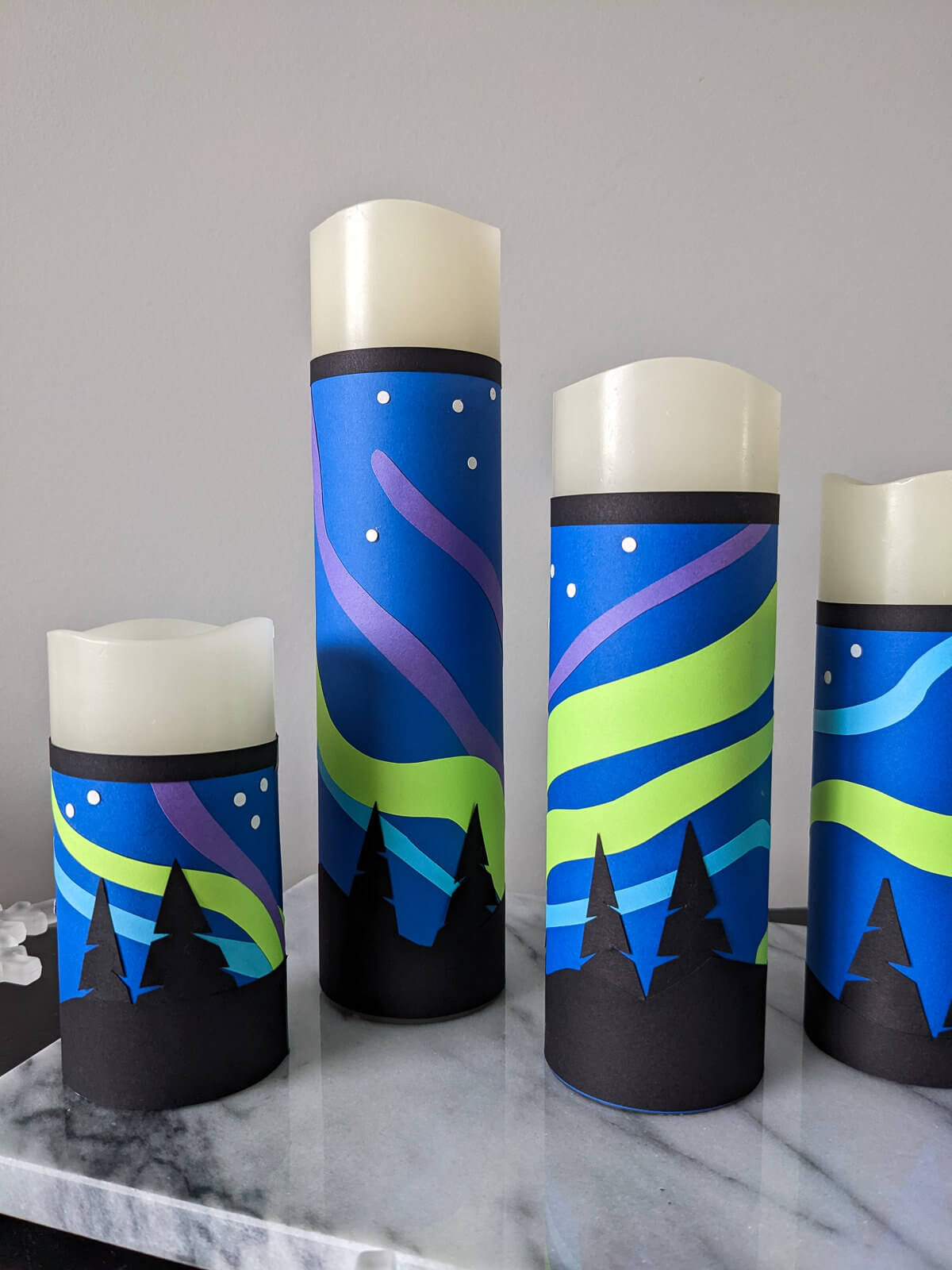 Winter craft: DIY Northern Lights candle wraps on flameless candles