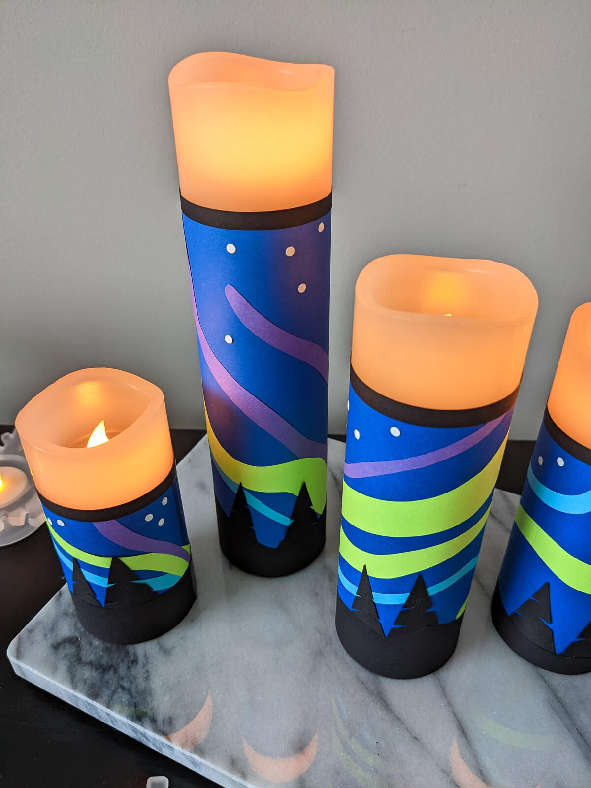 Northern Lights DIY candle wraps on battery-operated candles