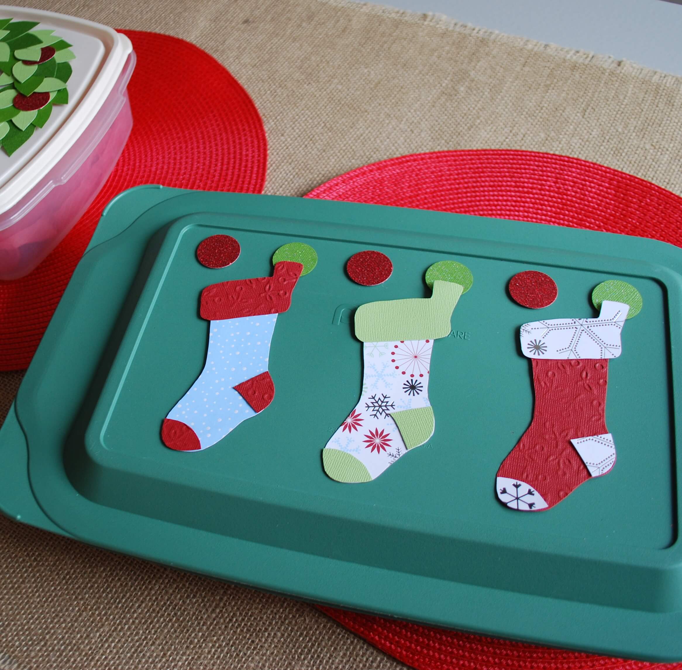 Decorate tupperware containers with stockings for Christmas cookie exhanges and potluck dinners