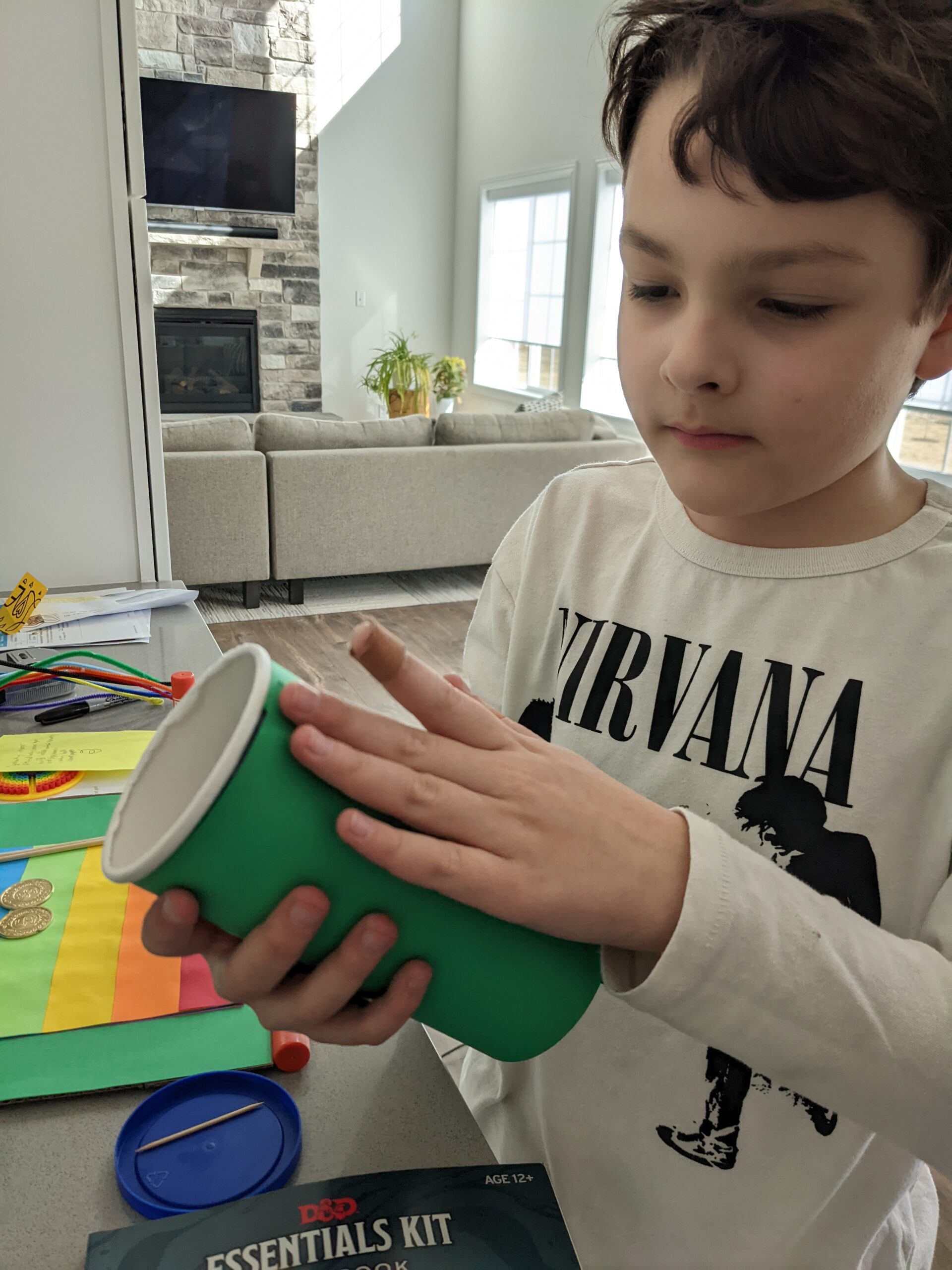 Liam making a Leprechaun trap from household supplies. Copyright 2022 Merriment Design Co. Do not use or distribute without written permission.