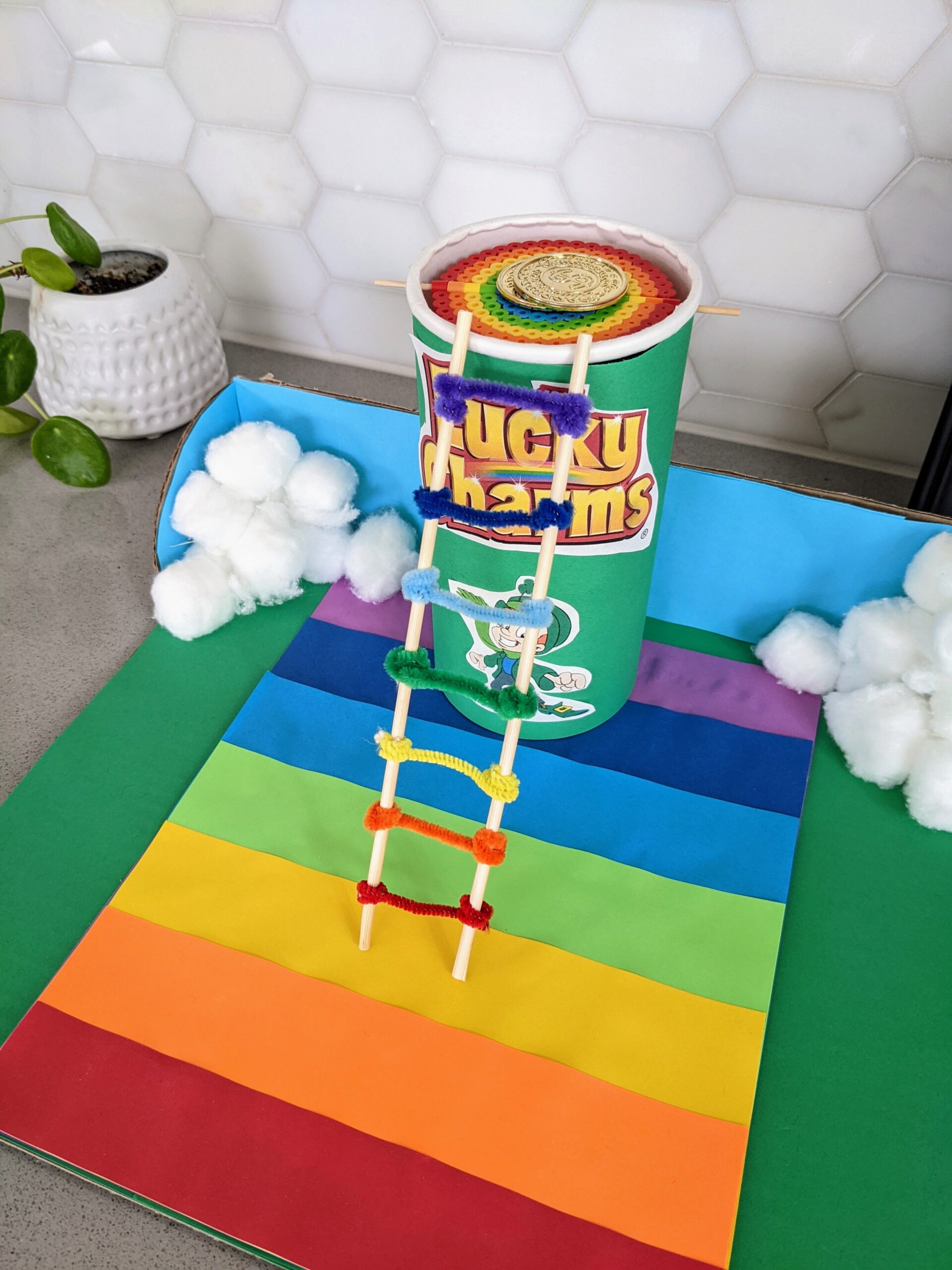 Leprechaun trap with a rainbow ladder and rainbow trap door