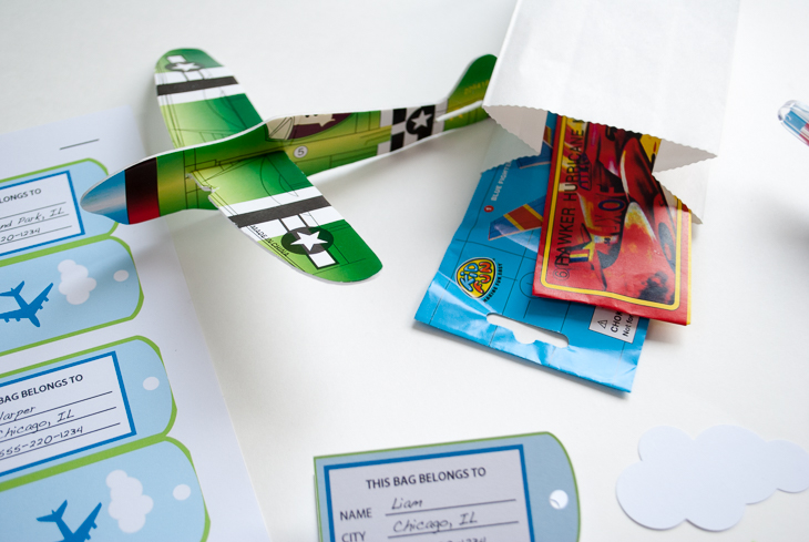 Printable personalized airplane favor bag (goodie bag) luggage tags for an airplane birthday party. Just type to personalize for party guests, print, cut out and tie onto your goodie/favor bags. What a cute and easy airplane birthday party favor bag idea!