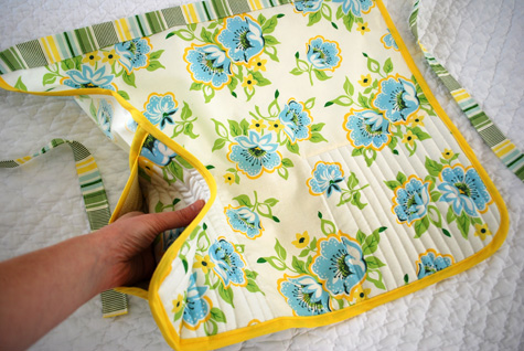 Free apron sewing pattern with built-in potholders and secret iPhone pocket