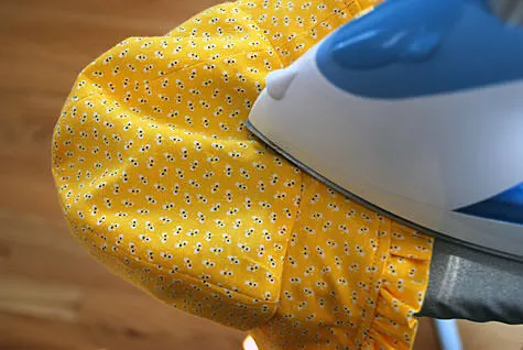 Ironing a baby bonnet