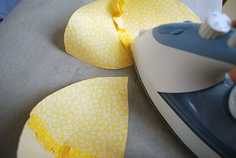 Ironing a baby hat brim