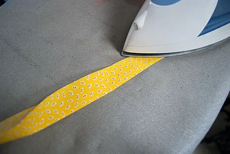 Ironing a baby bonnet hat ruffle