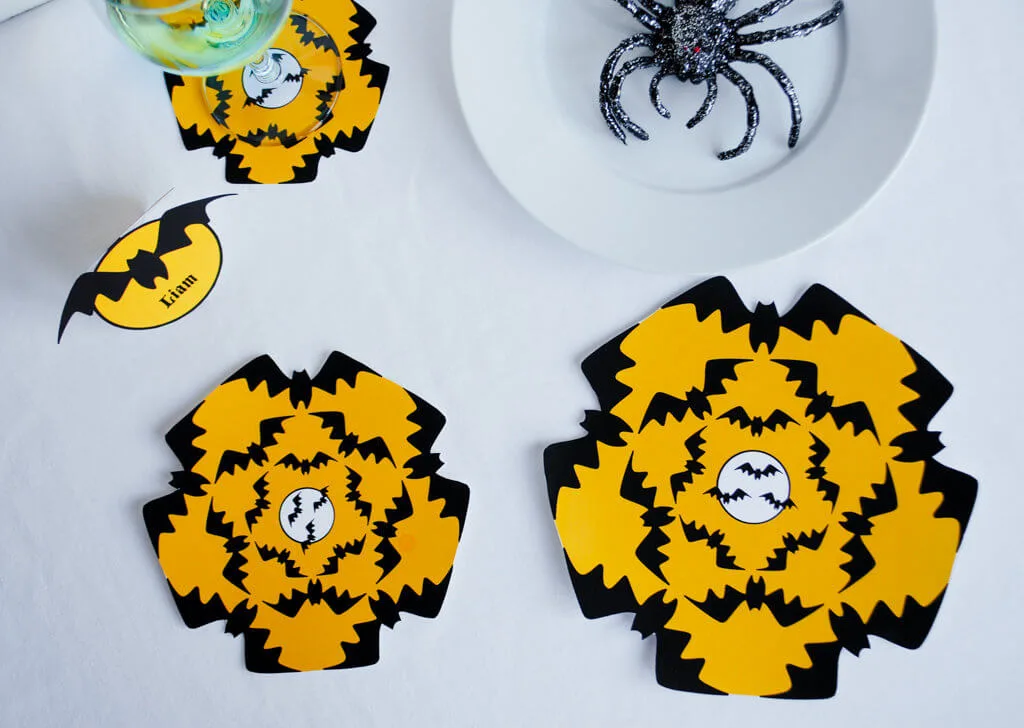 Eek Bats! Printable Halloween party decorations including this geometric bat "doily" | printable Halloween banner | last-minute Halloween | easy Halloween decorations | Bats #halloween #halloweendecorations #printables #bats #tablescape #decorations #halloweenbanner