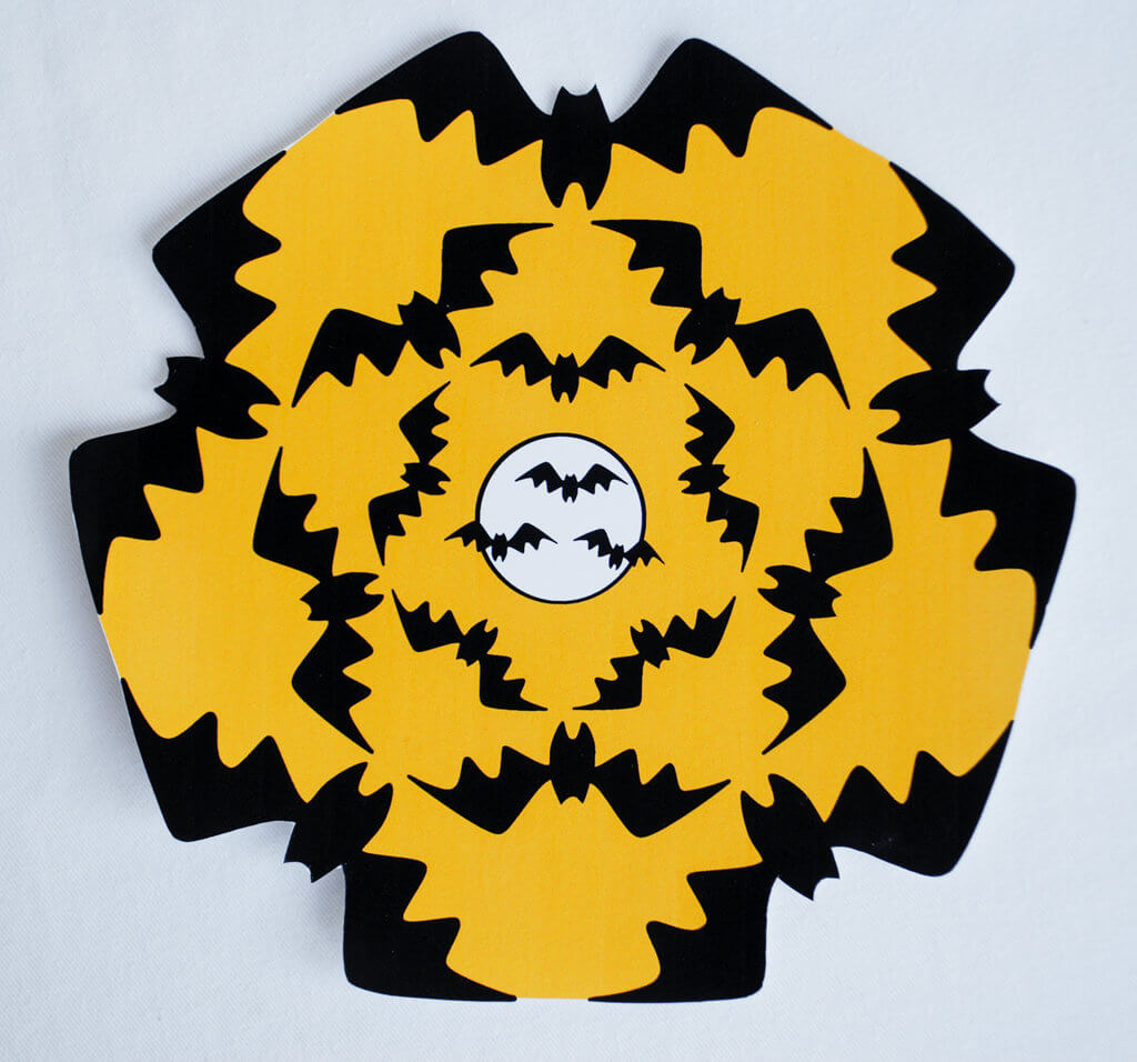 Eek Bats! Printable Halloween party decorations including this geometric bat "doily" | printable Halloween banner | last-minute Halloween | easy Halloween decorations | Bats #halloween #halloweendecorations #printables #bats #tablescape #decorations #halloweenbanner