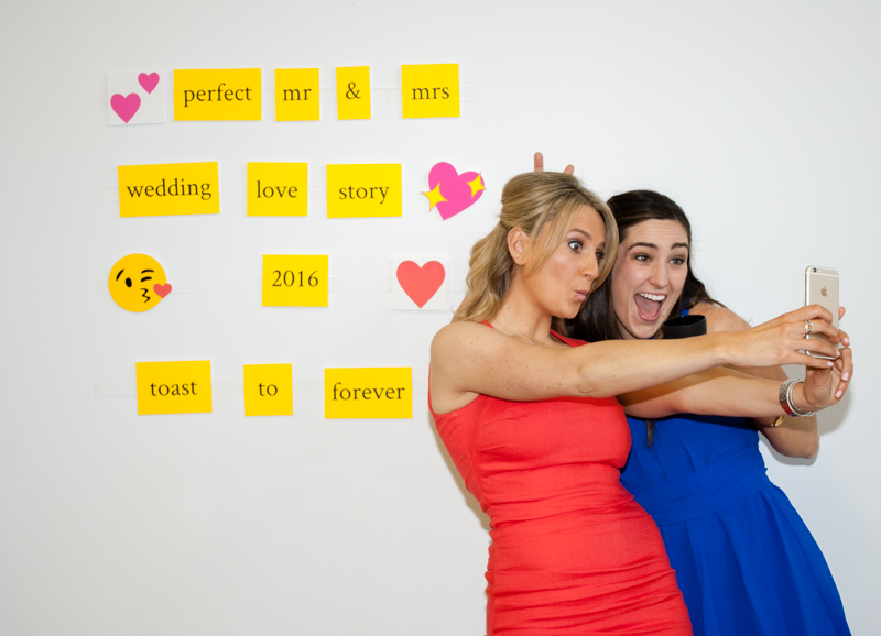 Best Wedding Wishes DIY Photo Booth Backdrop. Give wedding guests word tiles and emojis to spell their best wishes. Removes cleanly and easily from walls - no damage! What an easy and clever DIY photobooth and guest book idea!