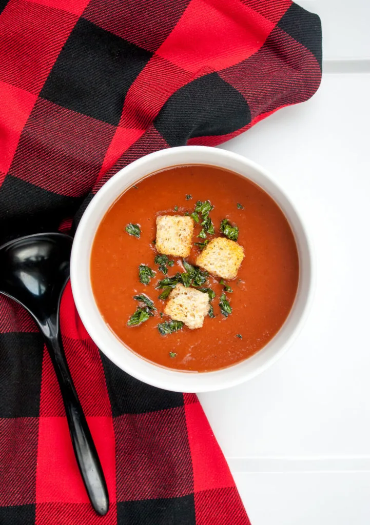 Classic roasted tomato soup recipe. This tomato soup is easy to make in winter because it uses canned tomatoes. #tomatosoup #souprecipe #soup #recipe