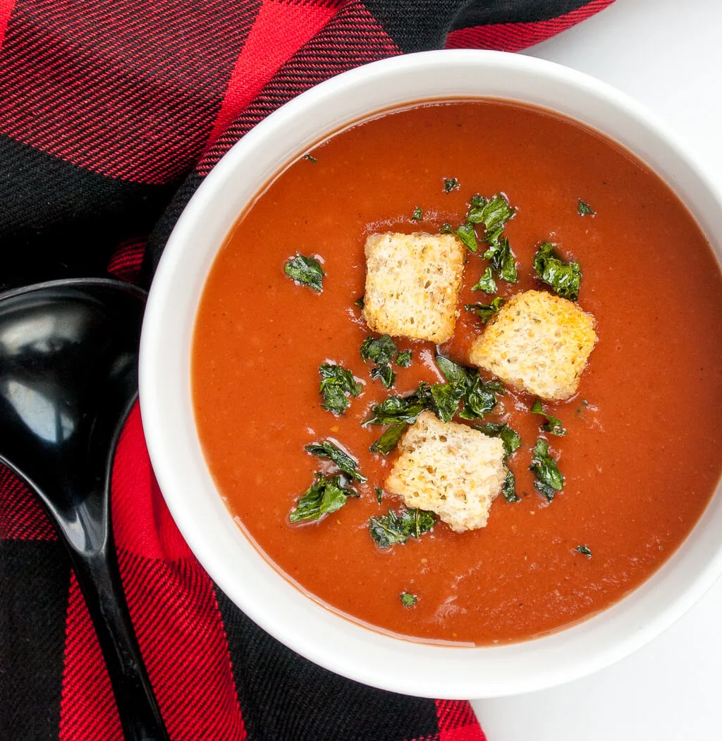 How to make classic roasted tomato soup. This roasted tomato soup recipe is easy to make in winter because it uses canned tomatoes. I made my soup with ingredients that Jewel-Osco delivered to my Chicago home. #tomatosoup #souprecipe #soup #recipe #JewelDelivers #ad