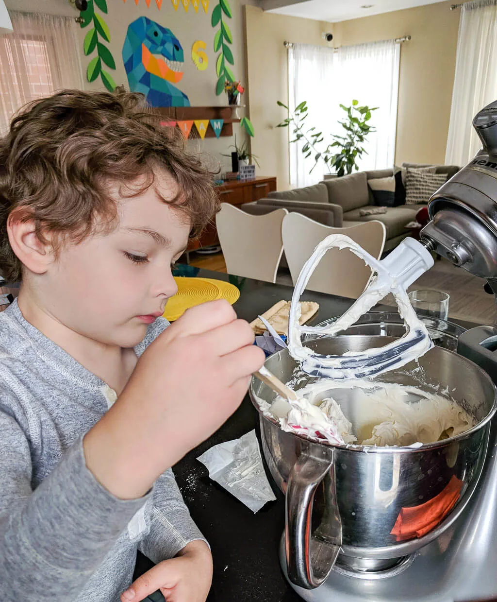 Making buttercream icing for a birthday cake. Copyright Merriment Design Co. Do not use photo without written permission.