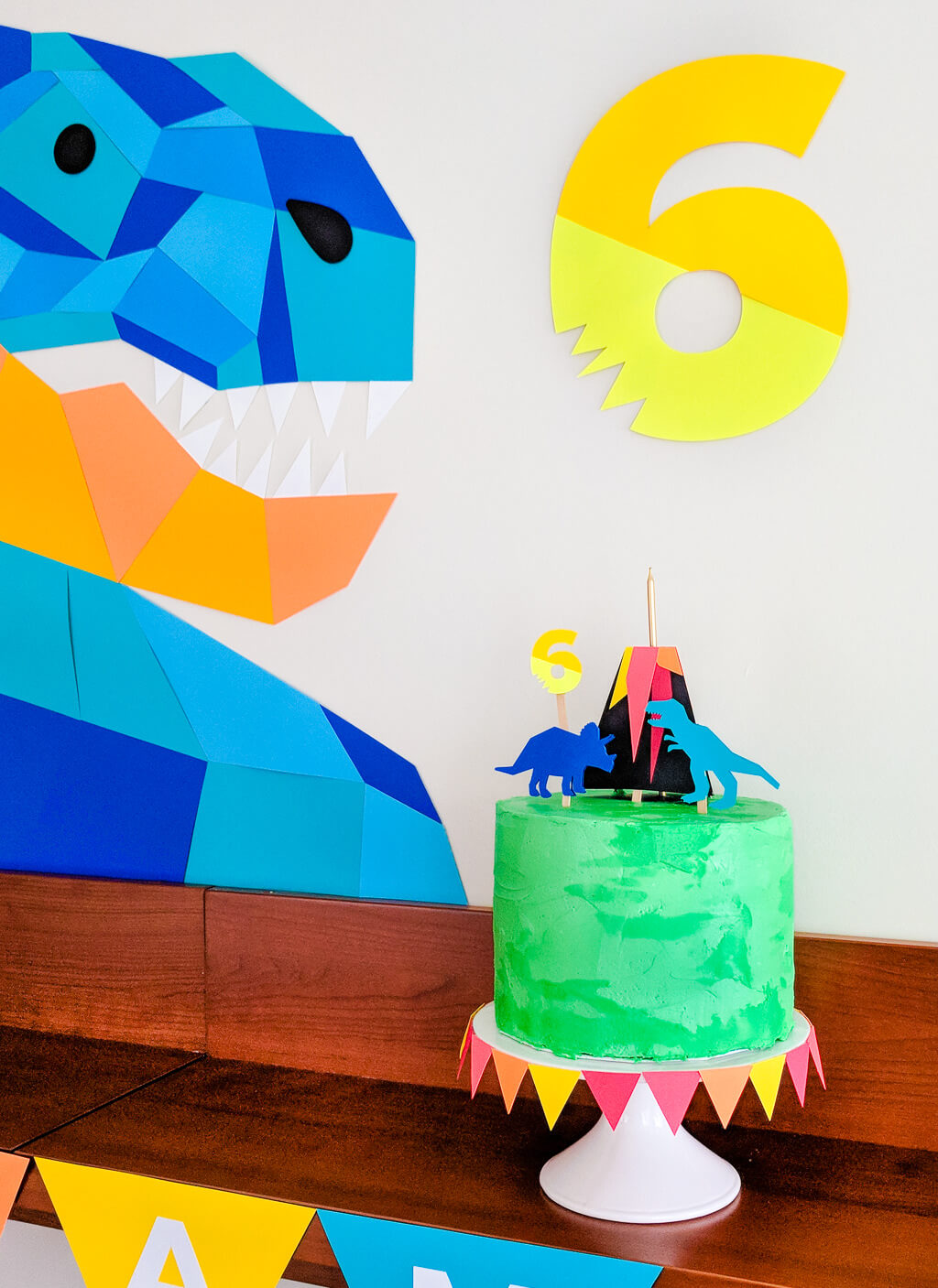 Easy DIY dinosaur cake and dinosaur decor