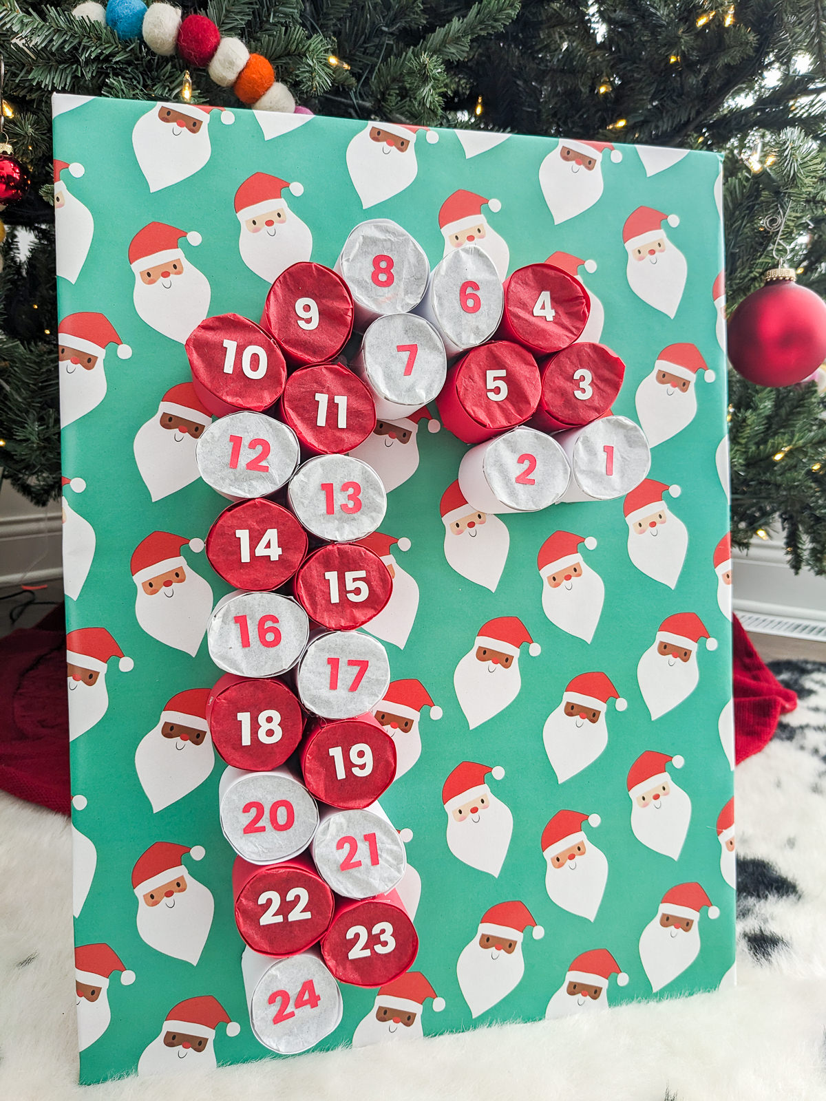 Candy Cane DIY advent calendar made using toilet paper rolls