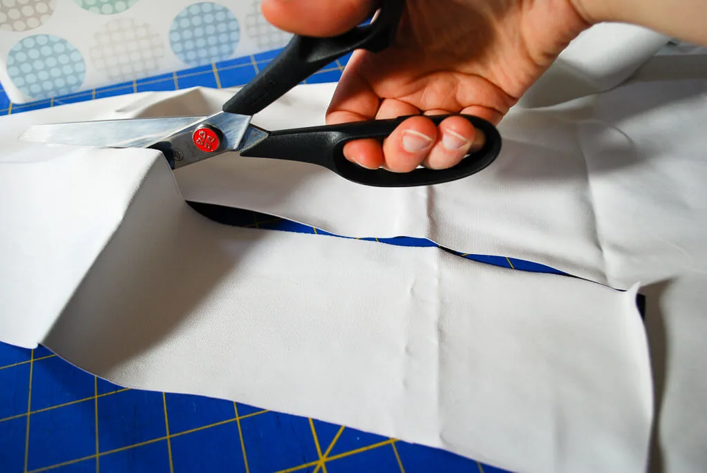 Cutting fabric with scissors