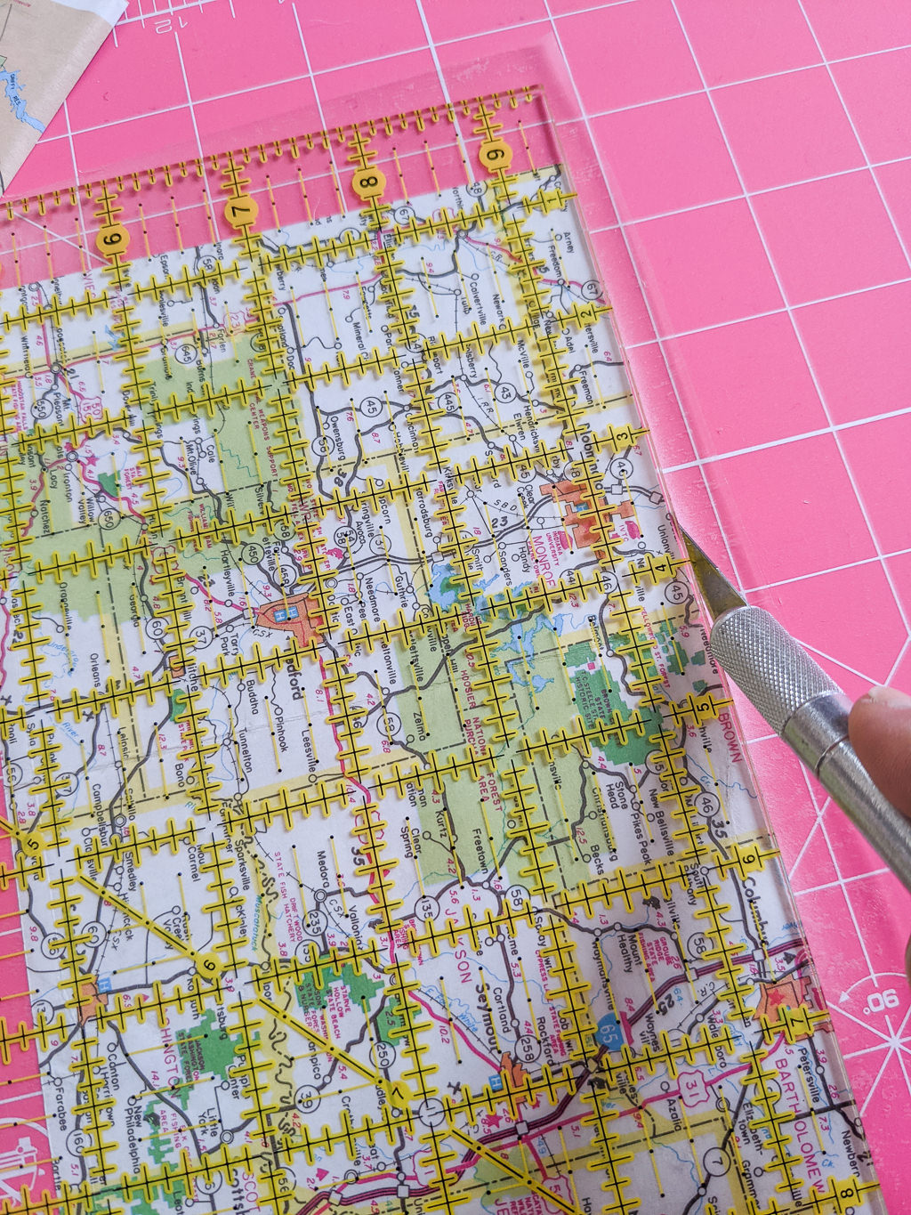 Trimming clear contact paper on paper using a craft knife