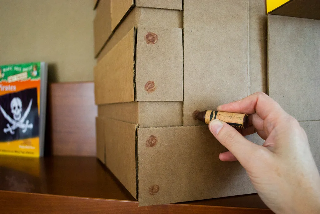 DIY Cardboard & Paper Magic Tree House Birthday Party Decoration. It's easy to recycle cardboard boxes into fun magic tree house birthday party decor for the food table.