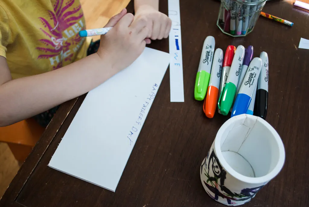 Draw on the foam sheet using permanent markers or pens