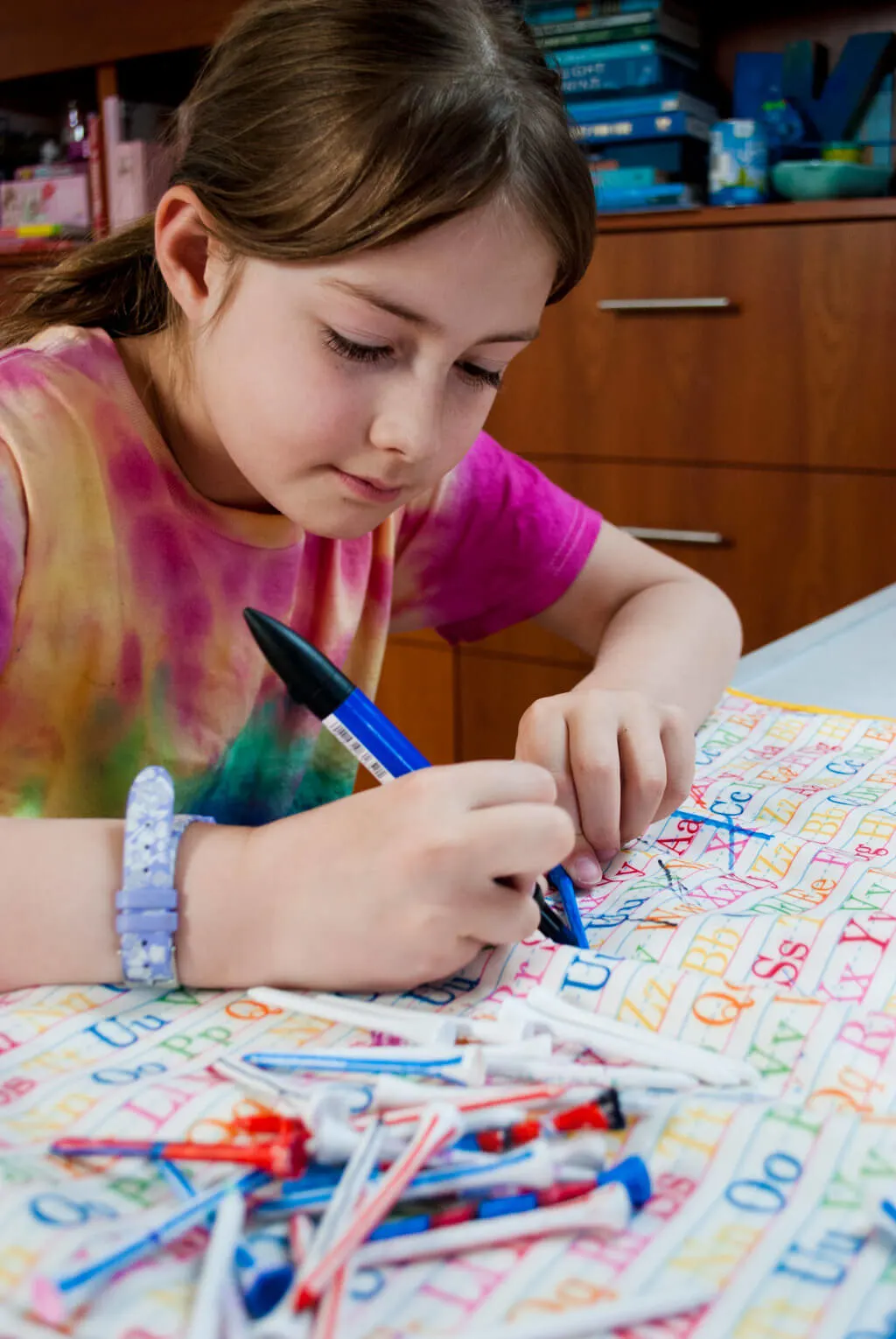 Kids coloring golf tees