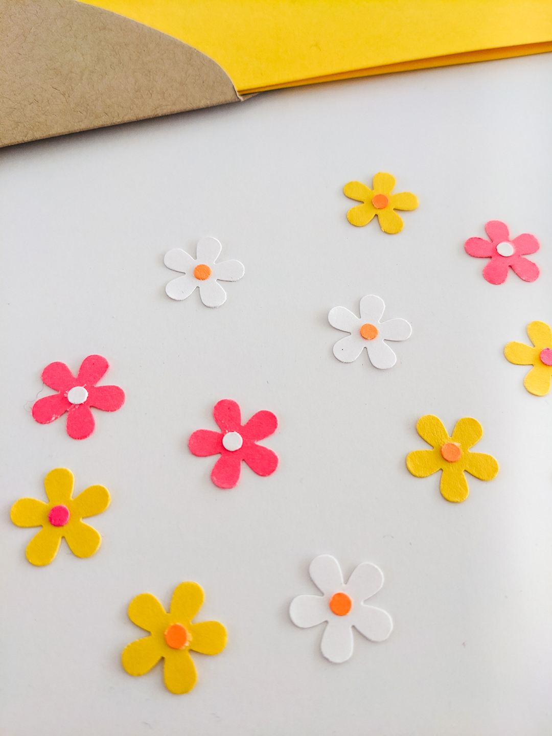 Paper flowers punched from cardstock paper using a paper punch