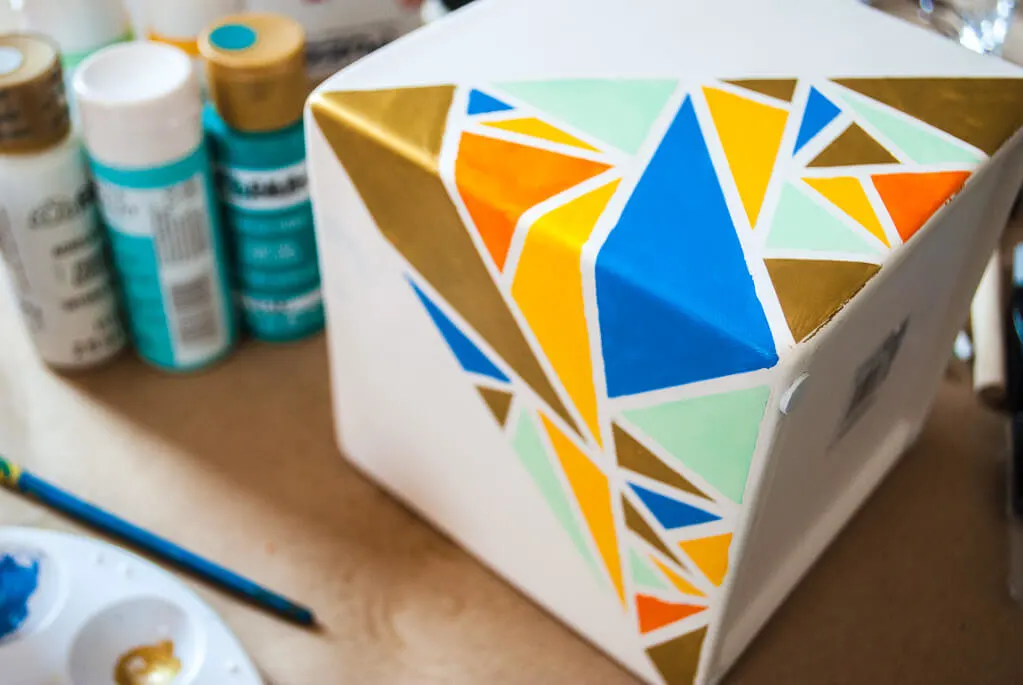 Painting a planter with geometric shapes