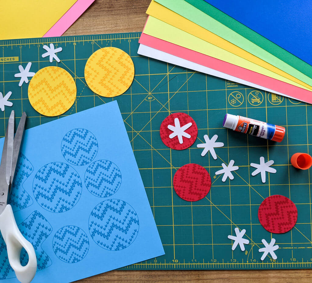 Paper Christmas ornament DIY with snowflakes and knitted pattern