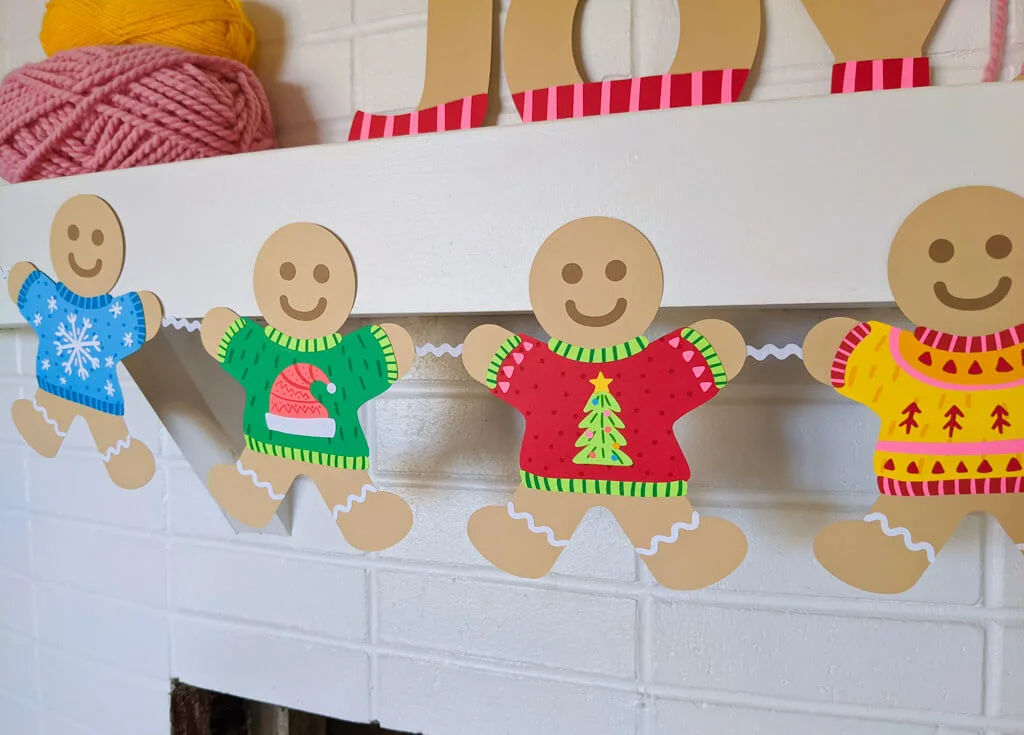 Paper DIY gingerbread garland with funny ugly Christmas sweaters