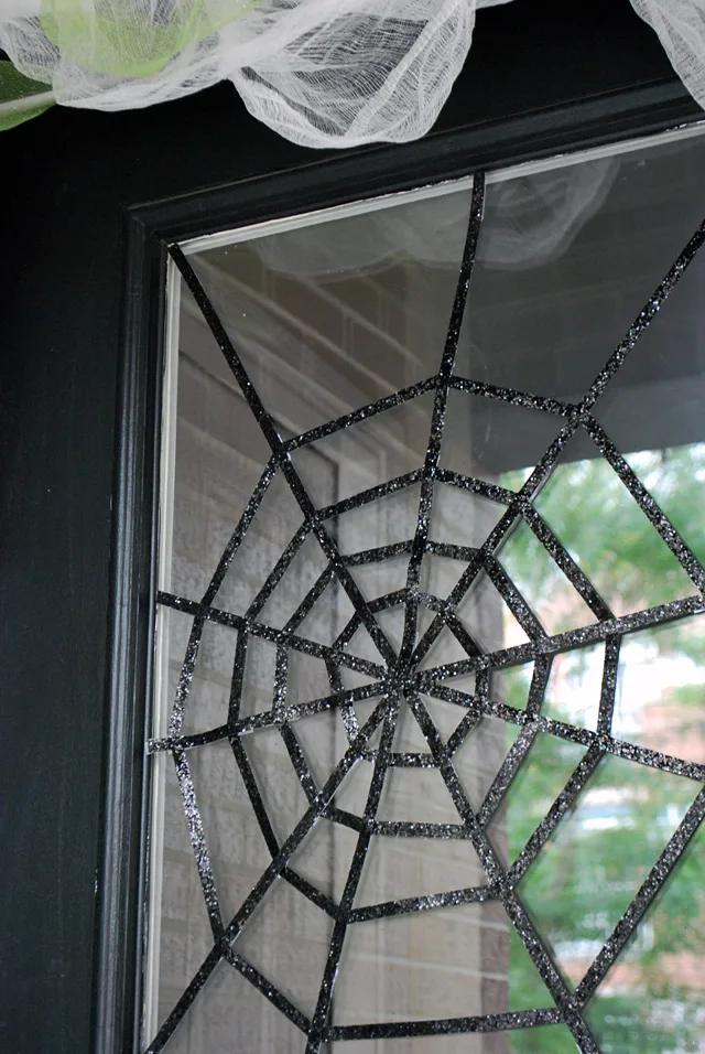 DIY Halloween Front Door Decoration - Subtle Spiderwebs