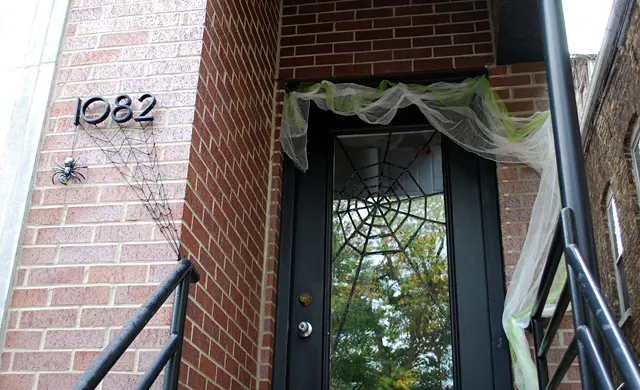 DIY Halloween Front Door Decoration - Subtle Spiderwebs