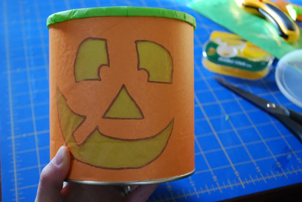 DIY Halloween luminaries from recycled baby formula cans