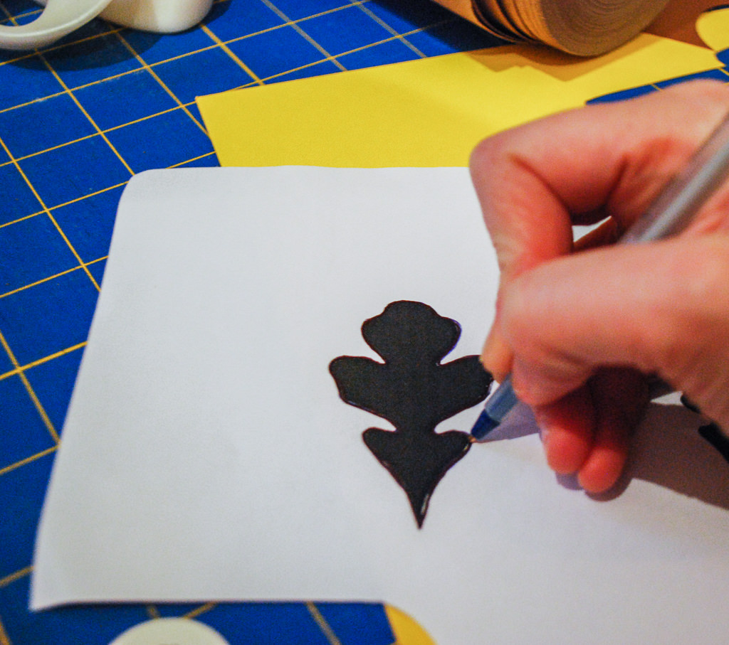 Tracing a leaf shape onto paper