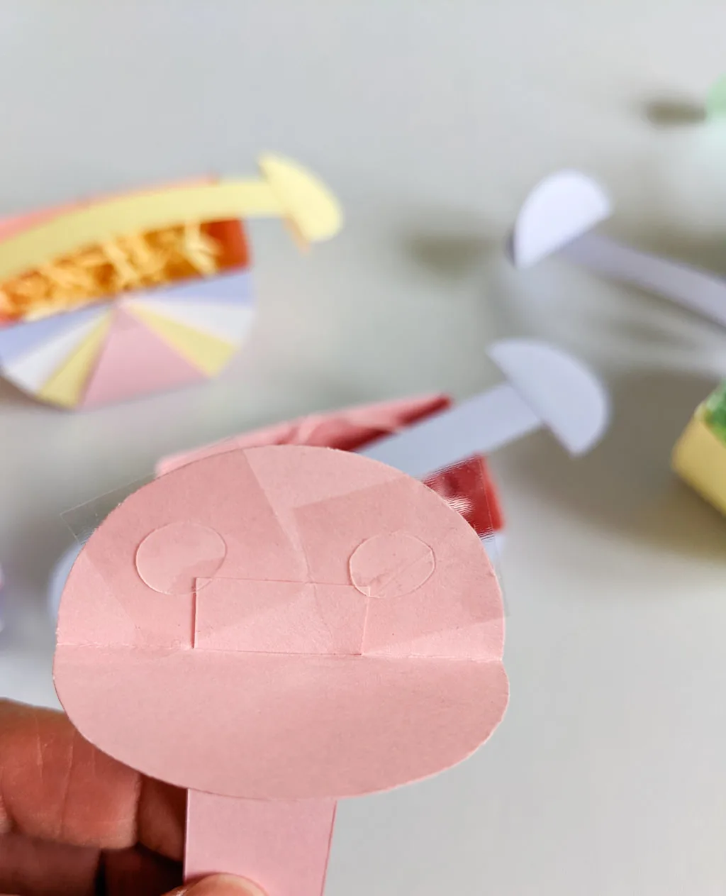 Glue dots on a paper Easter basket