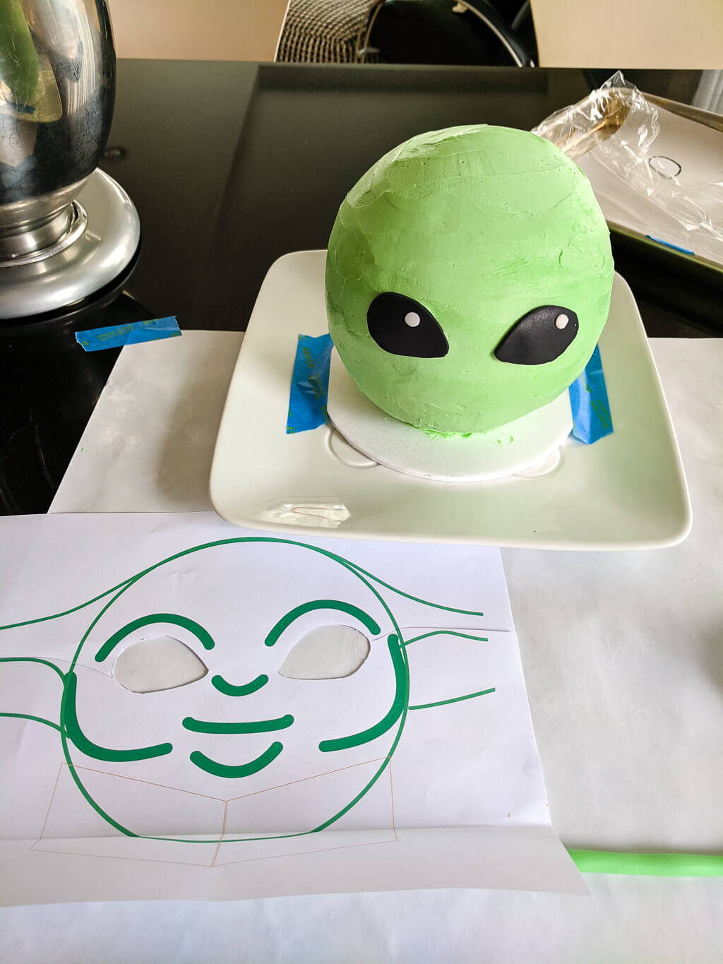 DIY Baby Yoda cake with fondant eyes