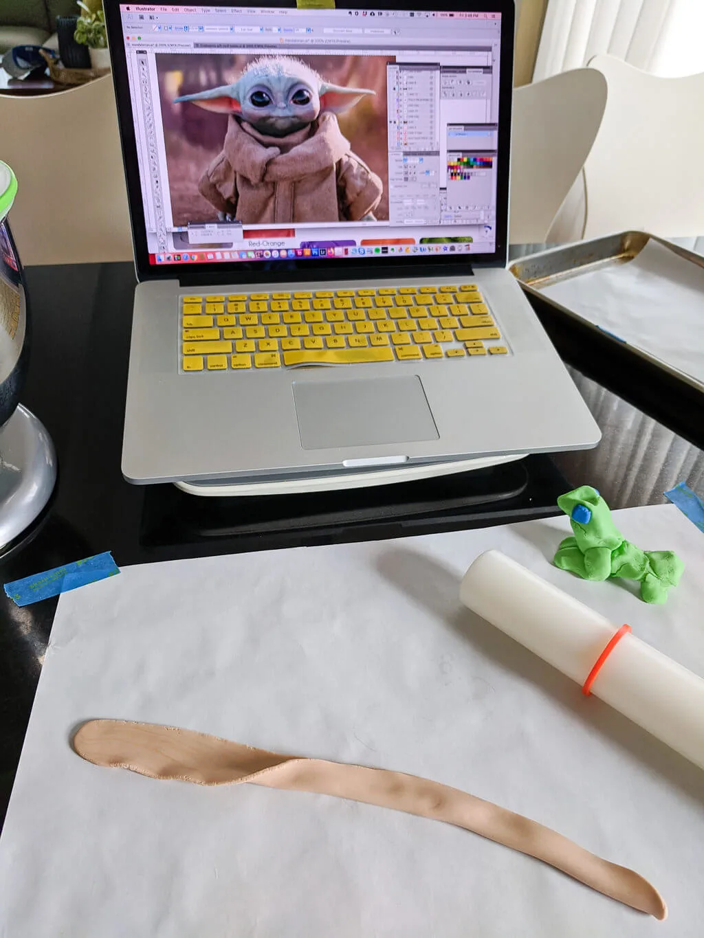 Baby Yoda picture on a laptop to make a Mandalorian cake