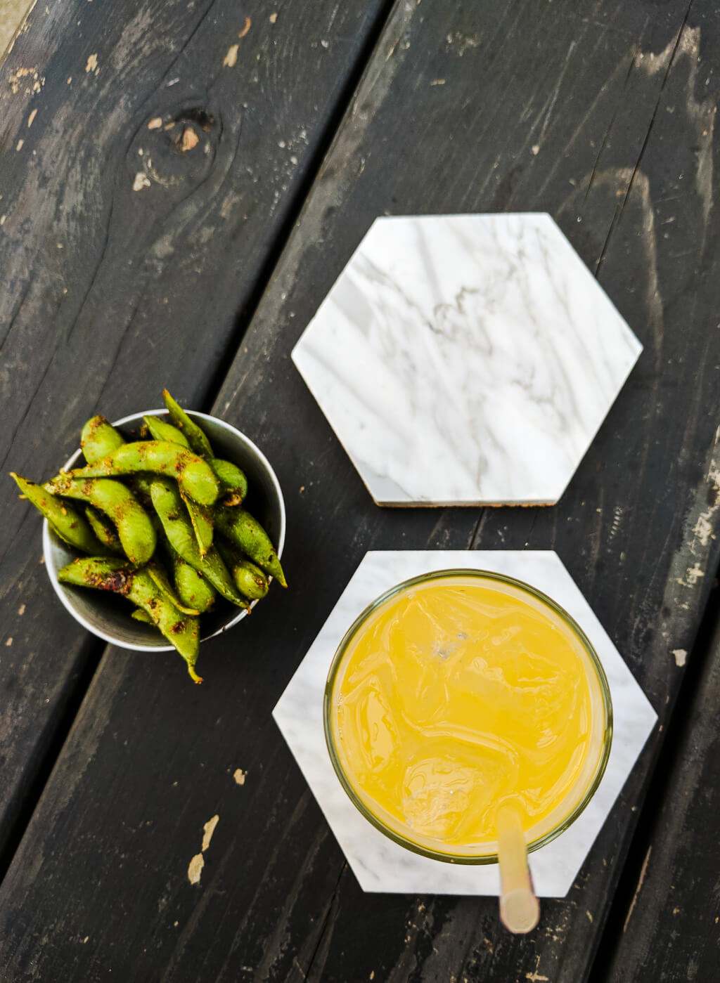 Easy DIY Hexagon Carrara Marble Coasters. Just Mod Podge cork on back of coasters and optionally seal. So easy and makes a stylish DIY gift! [easy DIY gift | DIY coasters | marble coasters | cork coasters | easy Mother's Day DIY gift | easy DIY Christmas gift | easy DIY housewarming gift]