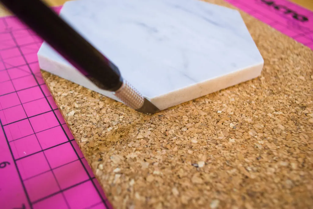 Cutting cork while making DIY coasters