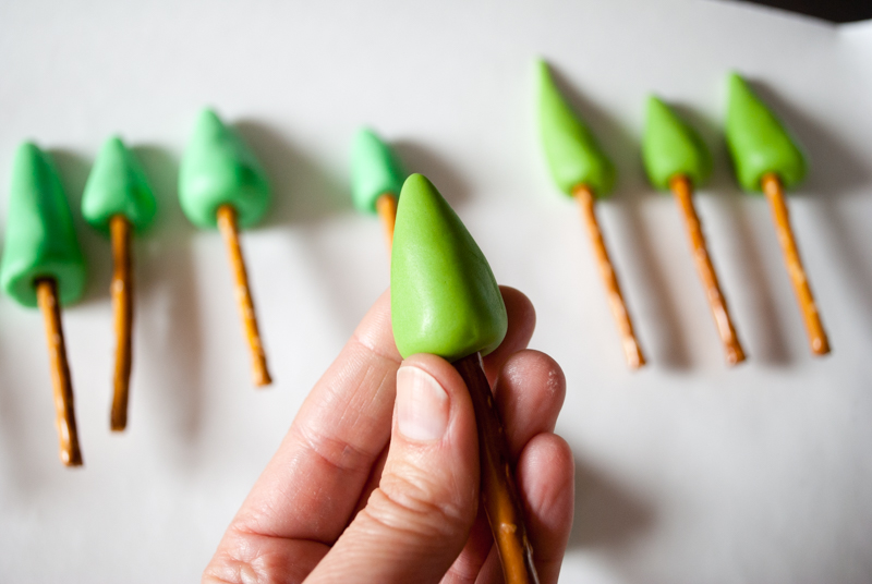 Easy DIY Planes Fire & Rescue Birthday Cake for your little fireman. This cute forest trees and flames cake is simple for beginners. Firemen Dusty, Blaze, Dipper and Windlifter are on their way to put out the forest fire in Piston Peak National Park! A trees birthday cake would be cute for a camping birthday party too.