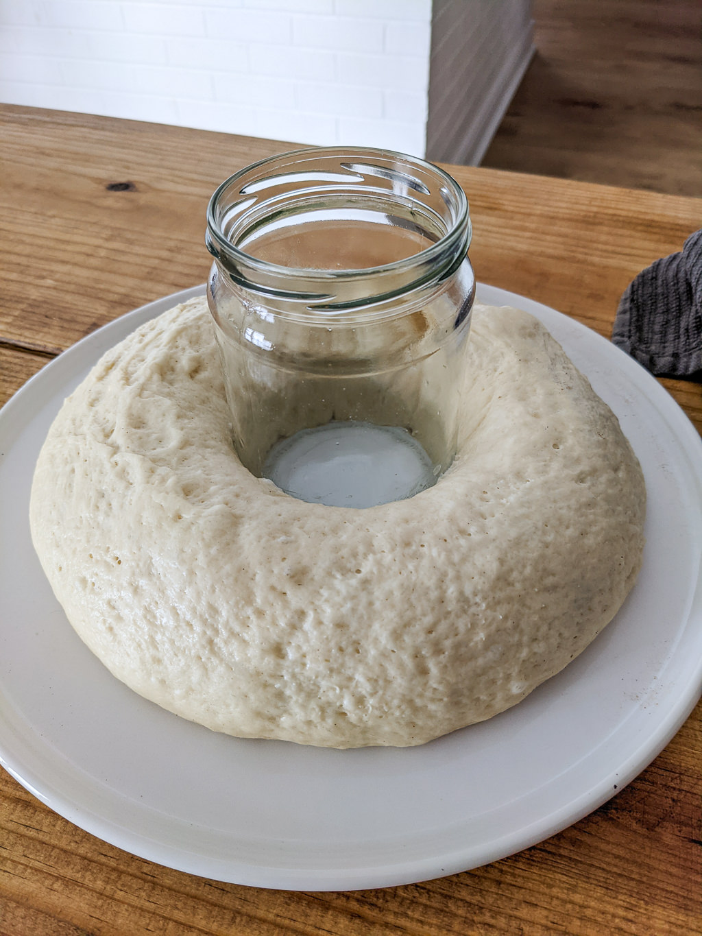 Using a ball jar to help a cinnamon roll wreath keep its shape