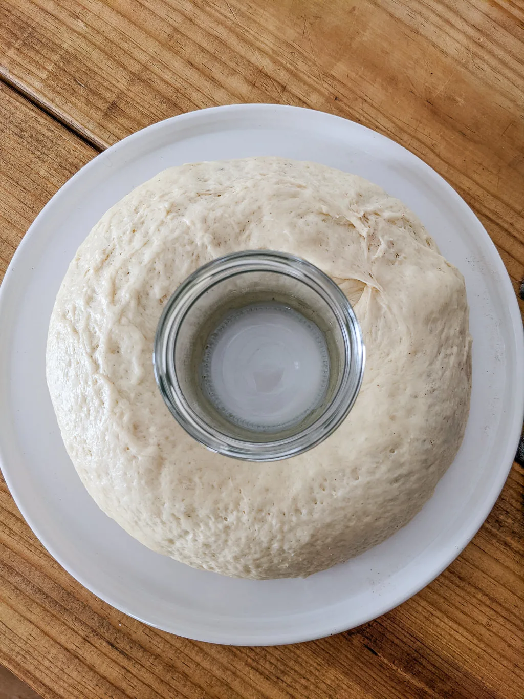 Using a ball jar to help a cinnamon roll wreath keep its shape