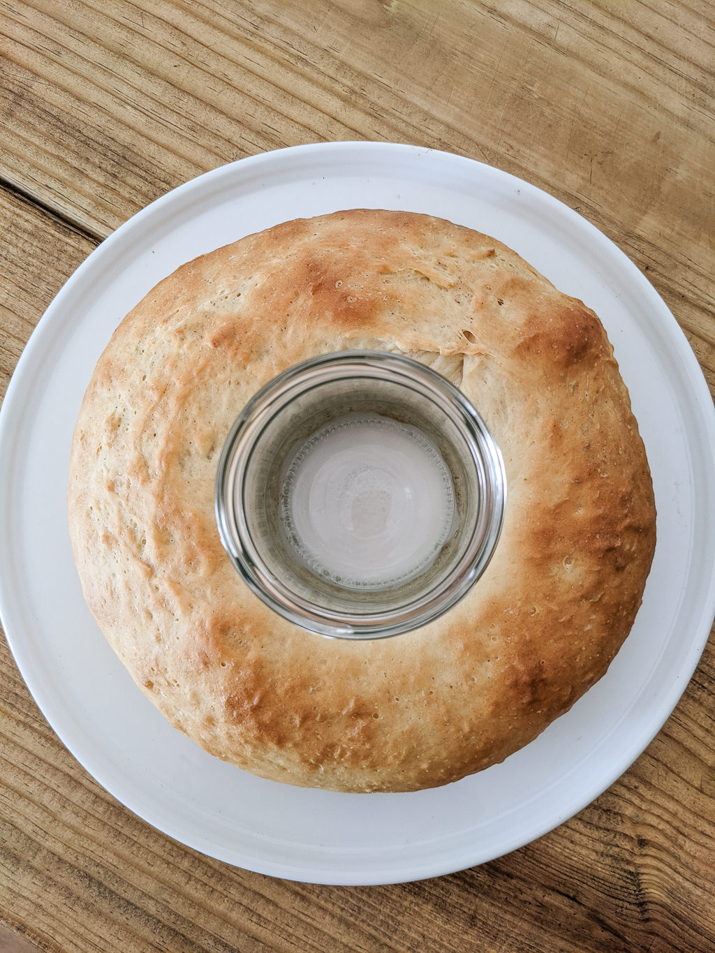 Using a ball jar to help a King Cake keep its shape while proofing