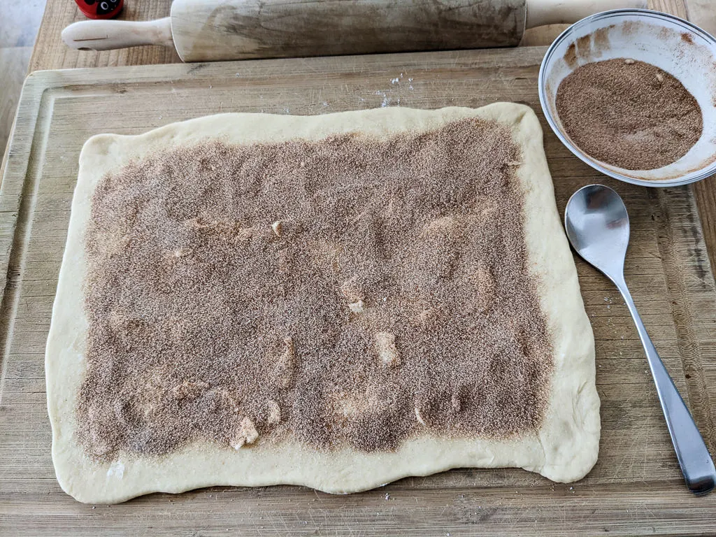 Making a cinnamon roll King Cake