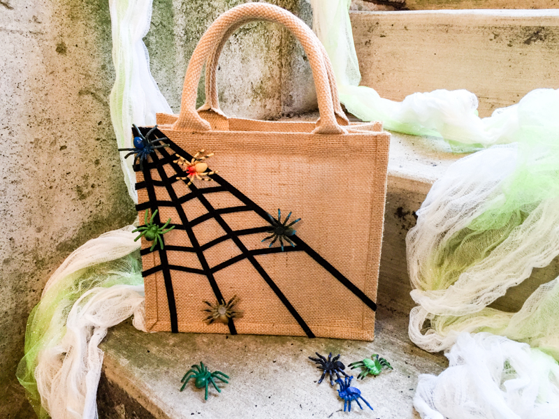 Easy No-Sew Sticky Spiderweb DIY Halloween Treat Bag for Kids