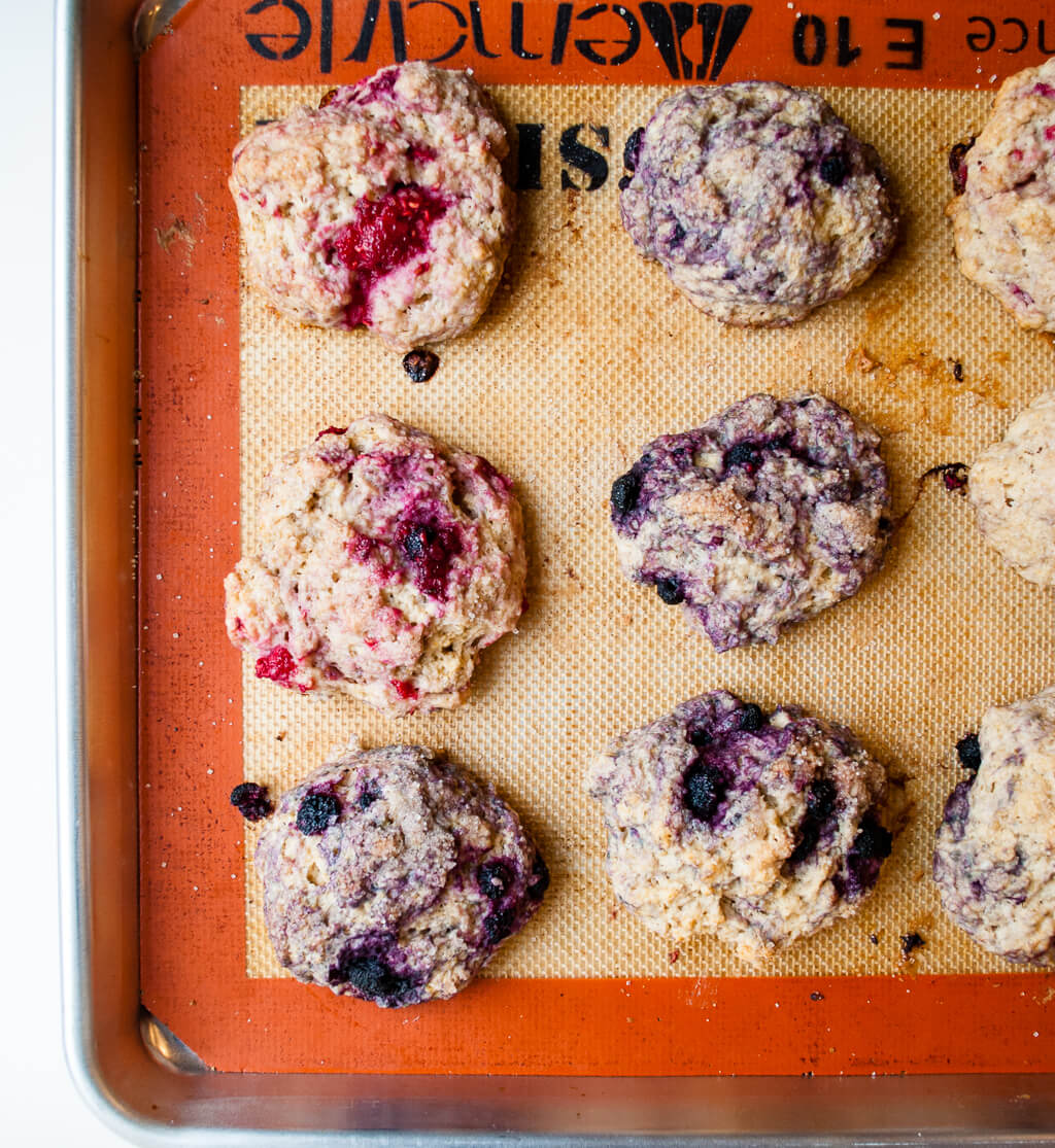 Berry scones on a baking sheet