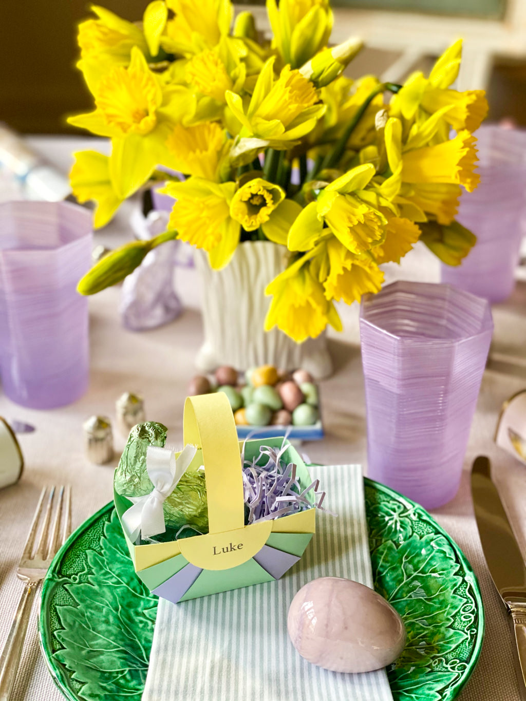 DIY Easter place cards on an elegant pastel Easter table