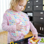 Extra long toddler-sized baby bib free sewing pattern for toddler-sized spills