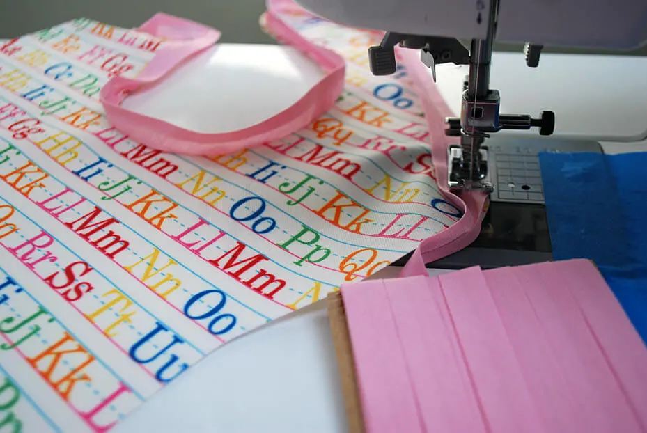 How to sew bias tape on a baby bib