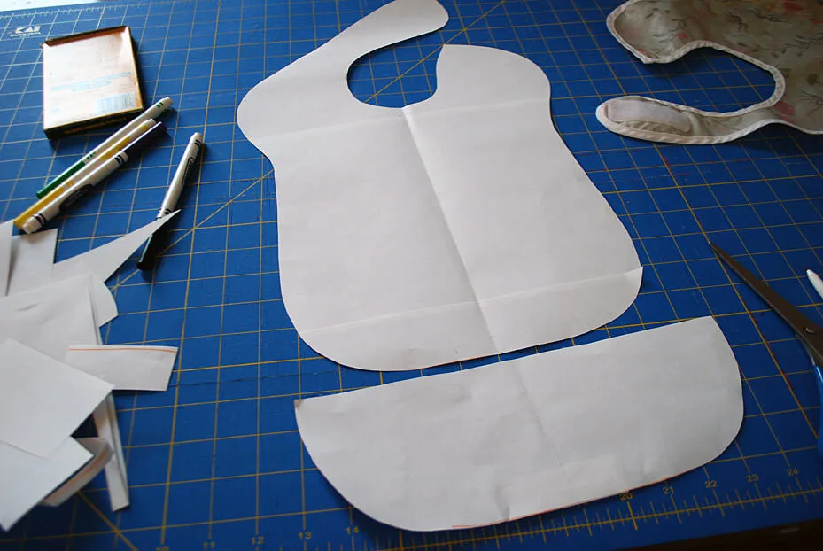 Free baby bib pattern sized for toddlers with pocket